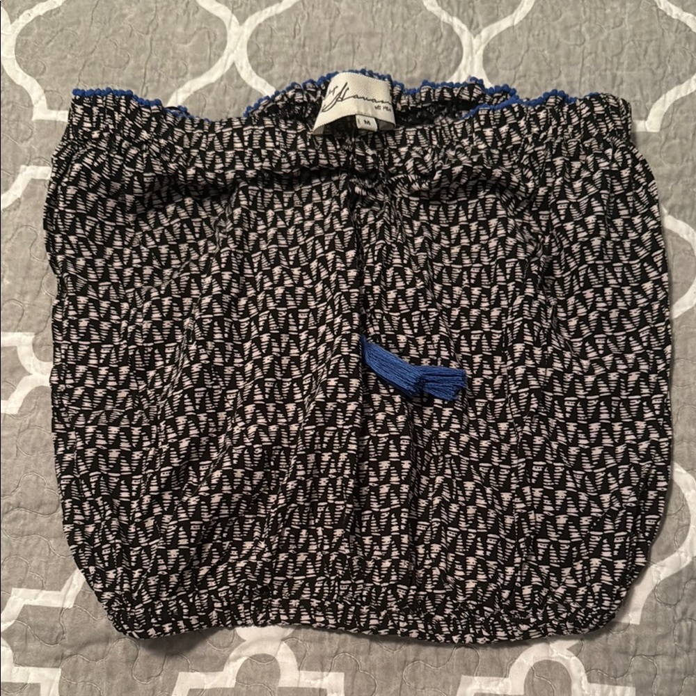 Black and White Patterned Skirt with Blue Accents